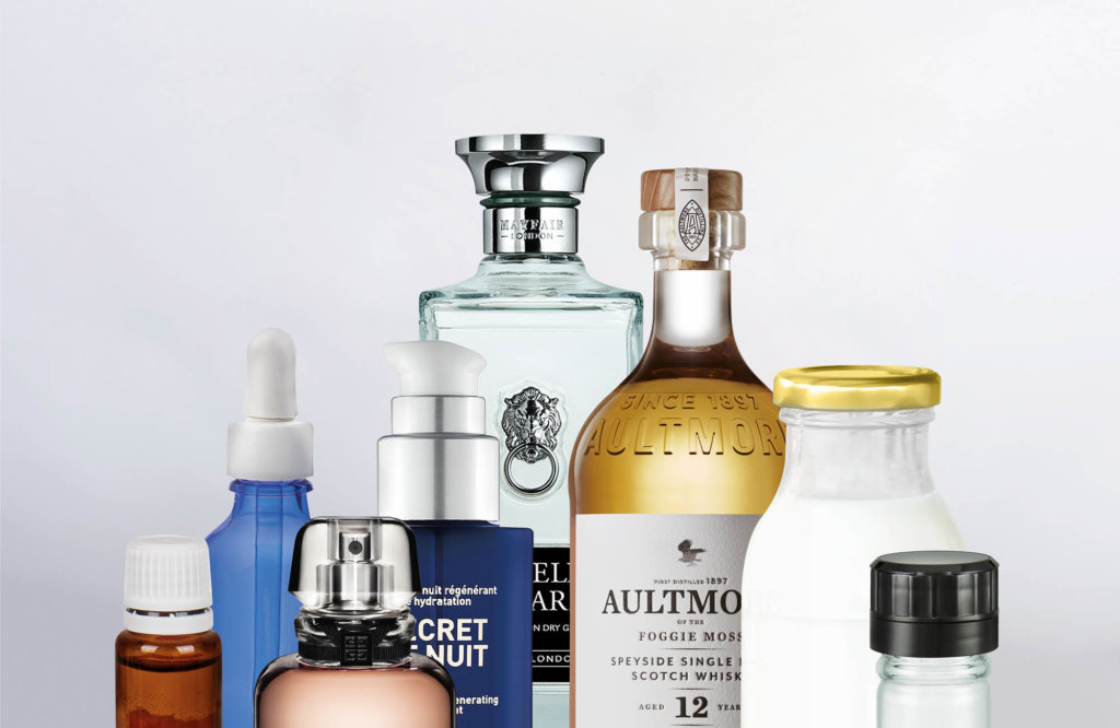 Caps and closures for glass packaging